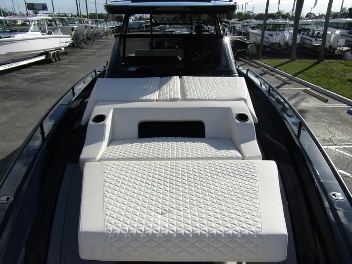  Yacht Photos Pics 2024 BRABUS Shadow 900 ST luxury boat with quilted seating in a marina.