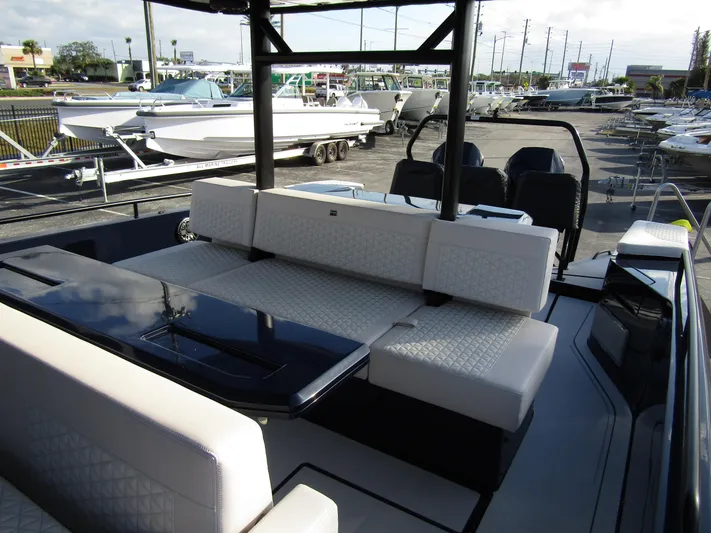  Yacht Photos Pics 2024 BRABUS Shadow 900 ST luxury boat interior with sleek seating and modern design.