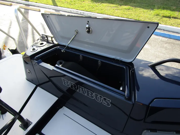  Yacht Photos Pics 2024 BRABUS Shadow 900 ST boat storage compartment open, showcasing sleek design.