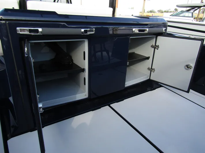 Yacht Photos Pics 2024 BRABUS Shadow 900 ST interior storage compartments with open doors.