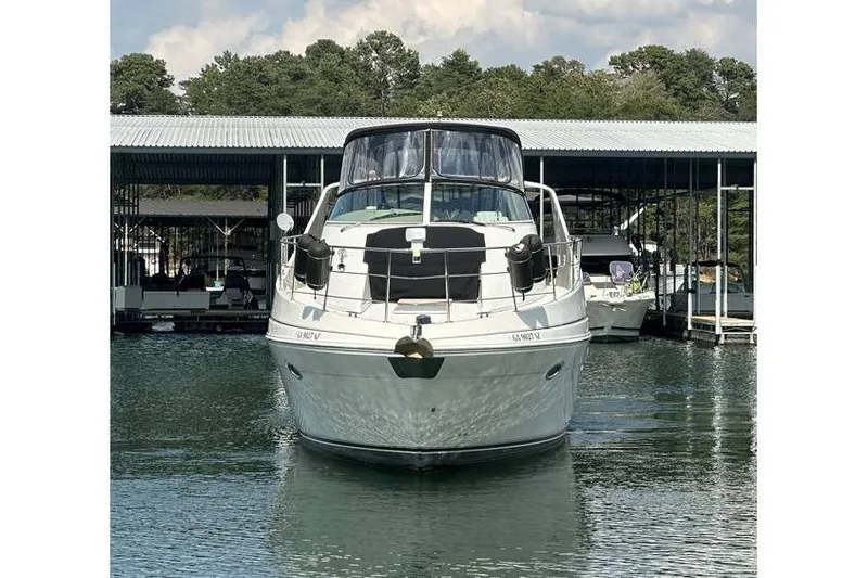  Yacht Photos Pics 2005 Carver 36 Mariner yacht docked at marina, front view.
