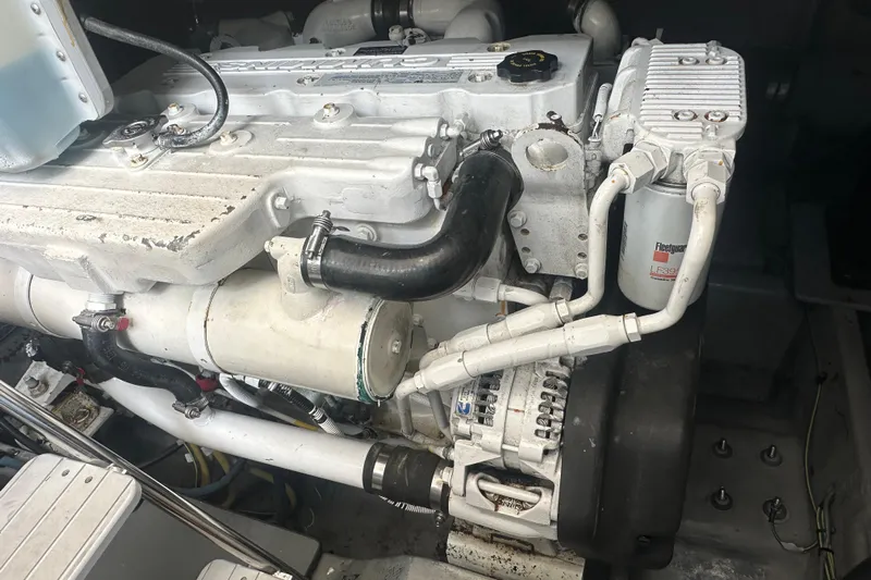  Yacht Photos Pics Engine compartment of a 2009 Meridian 441 Sedan boat, showcasing mechanical components.