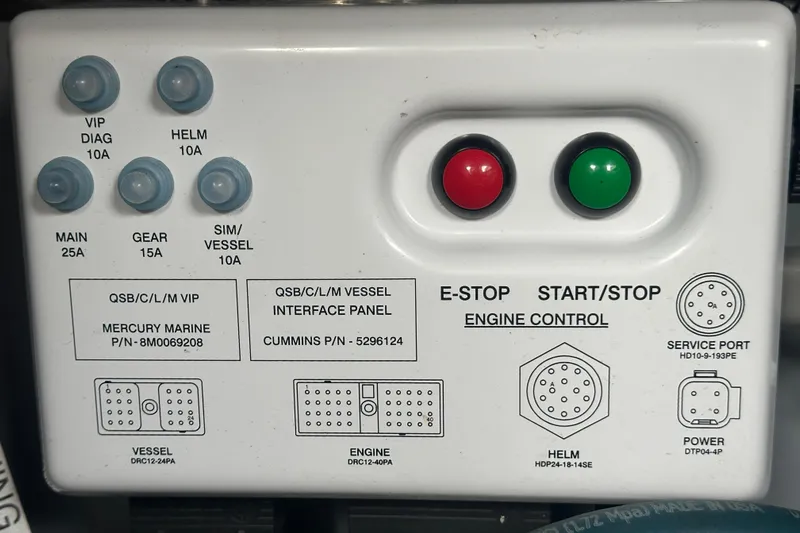  Yacht Photos Pics Control panel of a 2009 Meridian 441 Sedan with buttons and labeled ports.