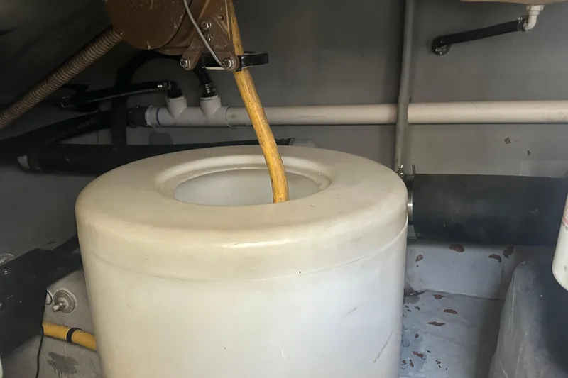  Yacht Photos Pics Engine room of 2009 Meridian 441 Sedan with visible components and piping.