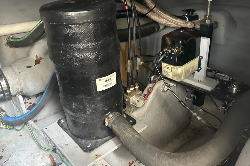  Yacht Photos Pics Engine compartment of a 2009 Meridian 441 Sedan with visible components and wiring.