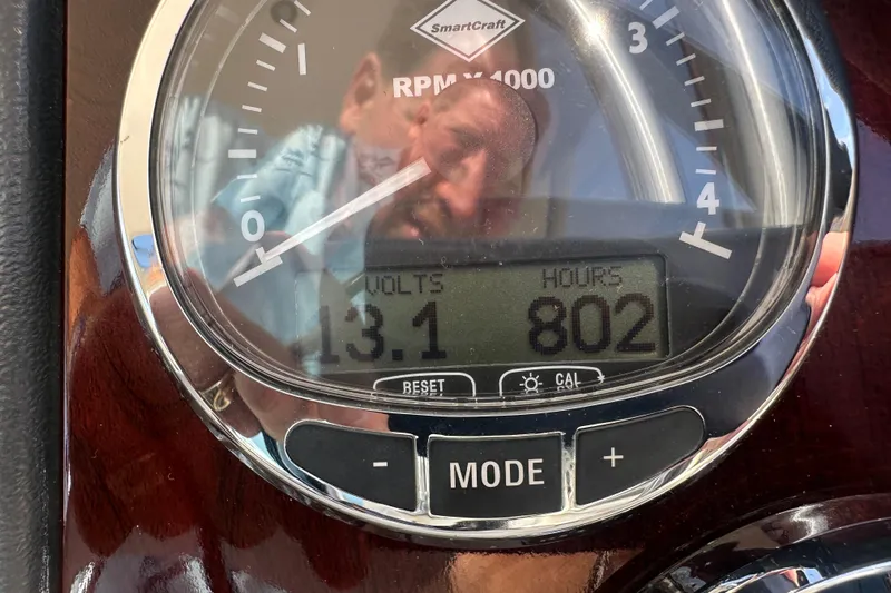  Yacht Photos Pics Close-up of a 2009 Meridian 441 Sedan gauge showing 802 hours and 13.1 volts.