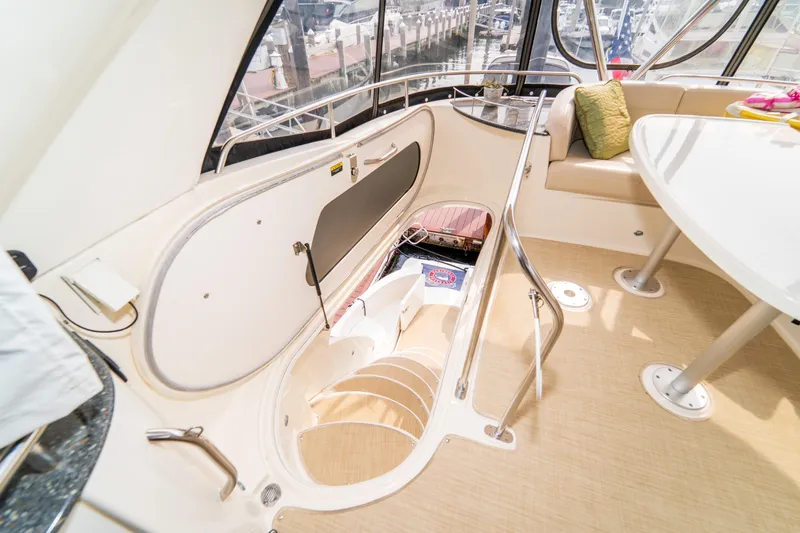  Yacht Photos Pics Interior of 2009 Meridian 441 Sedan yacht with stairs and seating area.