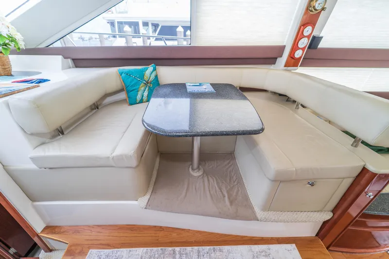  Yacht Photos Pics Luxurious seating area in a 2009 Meridian 441 Sedan yacht with elegant decor.