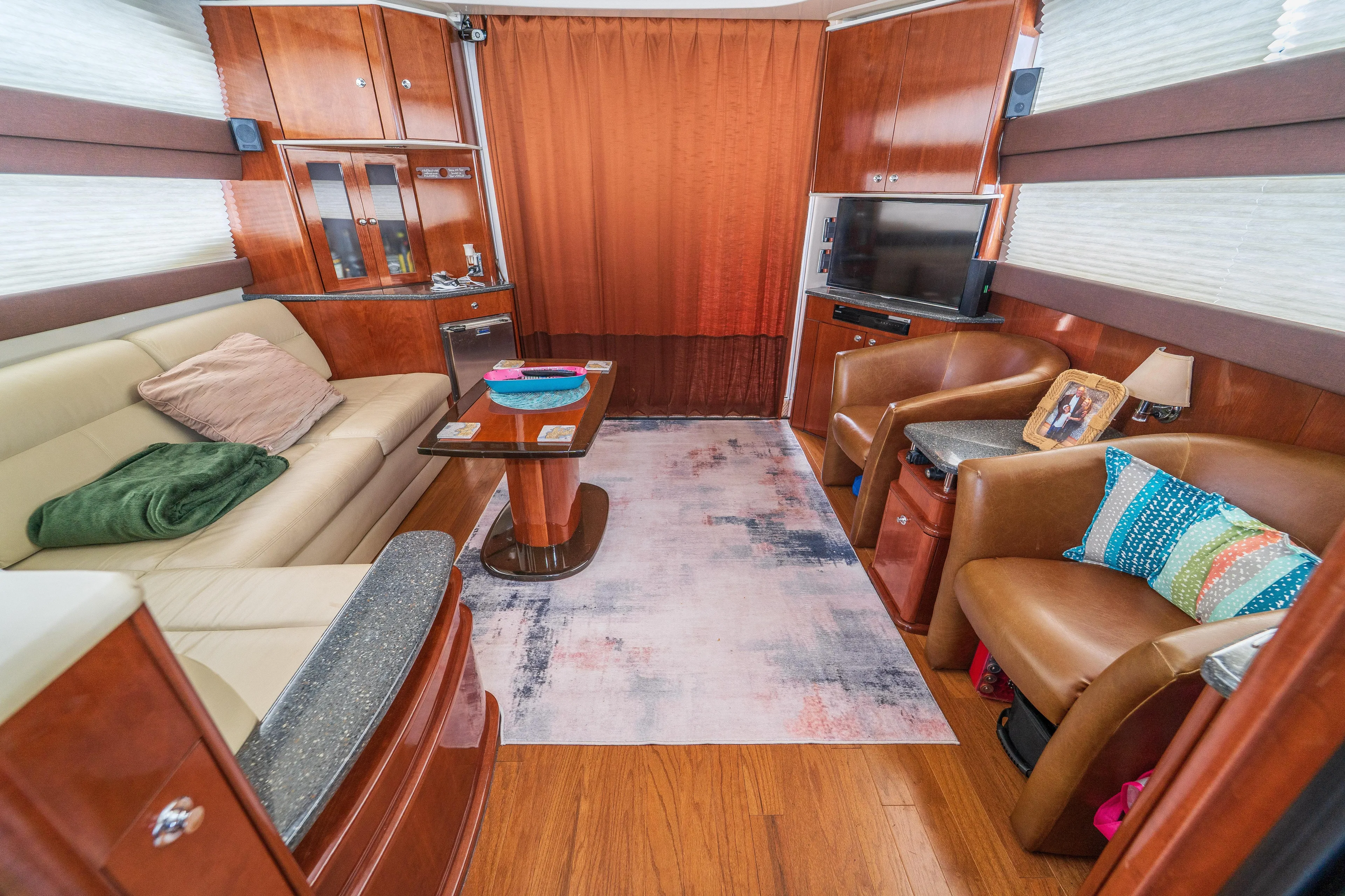  Yacht Photos Pics Luxurious interior of a 2009 Meridian 441 Sedan yacht with elegant furnishings.