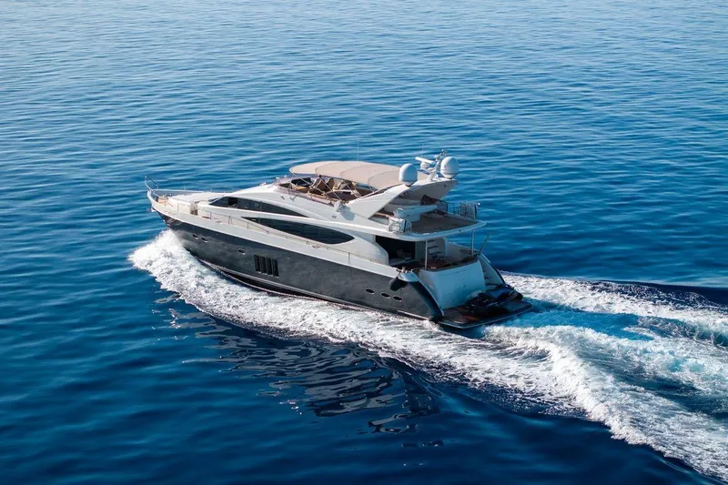  Yacht Photos Pics Luxurious 2010 Princess Flybridge 85 Motor Yacht cruising on open sea.