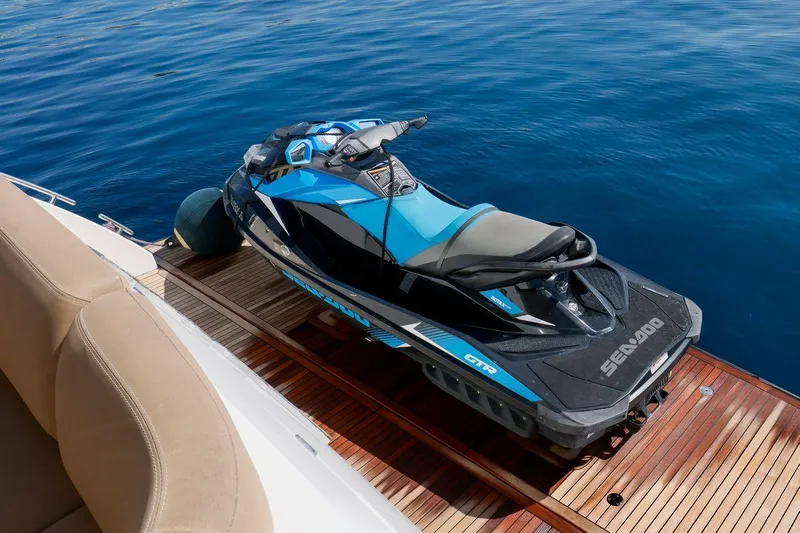  Yacht Photos Pics Jet ski on Princess Flybridge 85 Motor Yacht deck, 2010 model, with blue ocean backdrop.