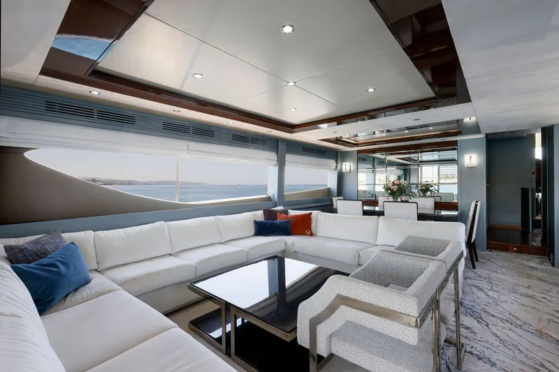  Yacht Photos Pics Luxurious interior of 2010 Princess Flybridge 85 Motor Yacht with elegant seating and ocean view.