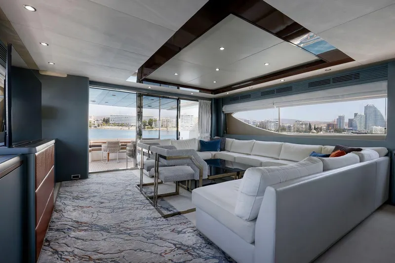  Yacht Photos Pics Luxurious interior of 2010 Princess Flybridge 85 Motor Yacht with elegant seating and scenic views.