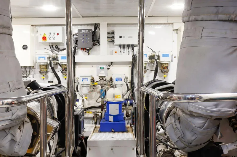  Yacht Photos Pics Engine room of 2010 Princess Flybridge 85 Motor Yacht, showcasing machinery and equipment.
