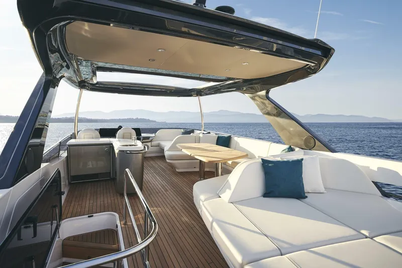  Yacht Photos Pics Luxurious 2026 Princess F65-079 yacht deck with elegant seating and ocean view.