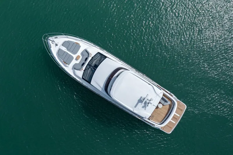  Yacht Photos Pics Aerial view of 2026 Princess F65-079 yacht on calm water.