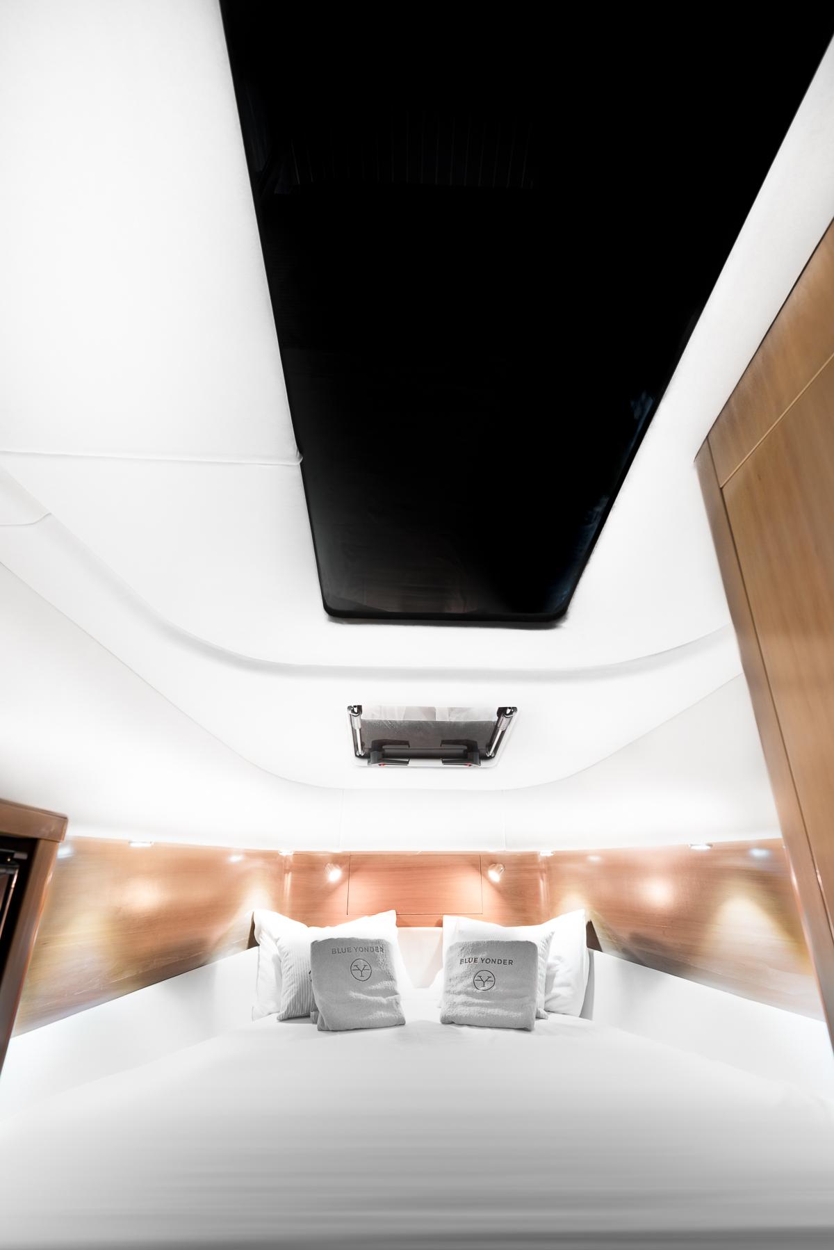 Interior cabin of 2017 Skipper 120S Desire with modern design and cozy bedding.