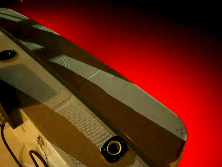  Yacht Photos Pics 2006 Silverton 34 Convertible boat with striking red underwater lighting.