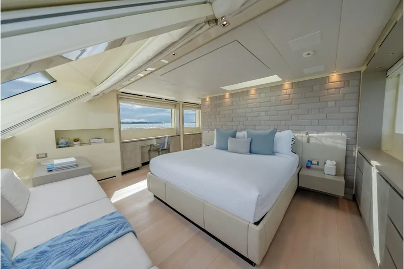Phoenix Yacht Photos Pics Luxurious bedroom interior on 2019 Sanlorenzo SD112 yacht with modern design and ocean view.