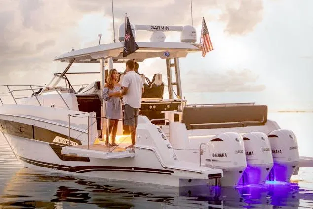  Yacht Photos Pics 2023 Jeanneau Leader 12.5 WA boat with Yamaha engines, cruising at sunset.