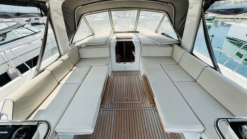  Yacht Photos Pics Luxurious interior of 2024 Beneteau Oceanis Yacht 54 with spacious seating and elegant design.