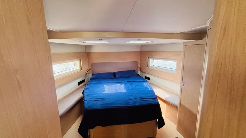  Yacht Photos Pics Luxurious cabin interior of 2024 Beneteau Oceanis Yacht 54 with modern design.