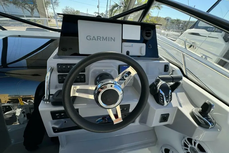  Yacht Photos Pics Helm of 2025 Jeanneau Leader 9.0 WA Series 2 with Garmin navigation system.