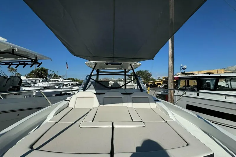  Yacht Photos Pics 2025 Jeanneau Leader 9.0 WA Series 2 boat with sunshade and spacious deck.