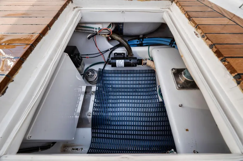  Yacht Photos Pics Engine compartment of 1996 Garlington 44 Express boat, showing mechanical components and wiring.