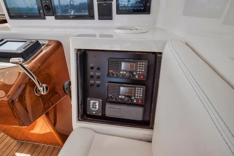  Yacht Photos Pics 1996 Garlington 44 Express yacht radio equipment and control panel.