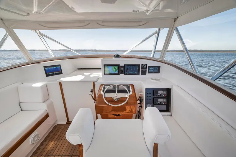  Yacht Photos Pics Helm of 1996 Garlington 44 Express yacht with modern navigation equipment.