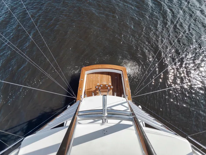  Yacht Photos Pics Aerial view of 1996 Garlington 44 Express yacht on water.