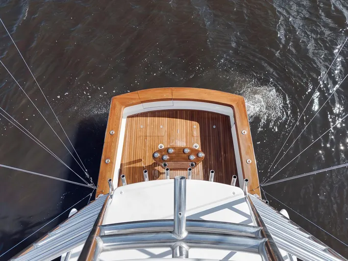  Yacht Photos Pics Overhead view of 1996 Garlington 44 Express yacht deck on water.