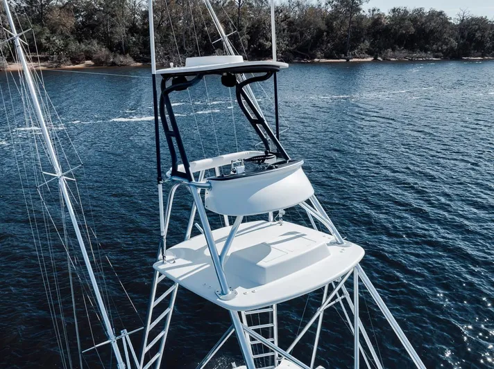  Yacht Photos Pics Aerial view of 1996 Garlington 44 Express boat on calm water.