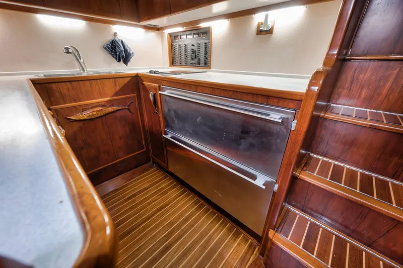  Yacht Photos Pics Luxurious wooden interior of a 1996 Garlington 44 Express yacht kitchen.