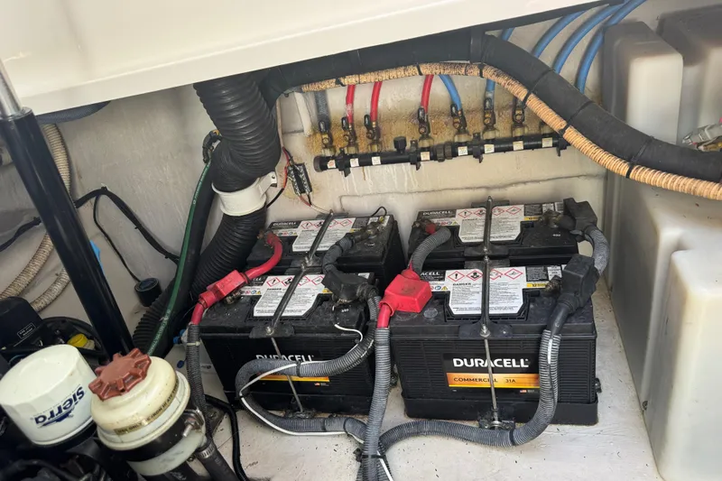  Yacht Photos Pics Engine compartment of 2010 Sea Ray 390 Sundancer with Duracell marine batteries.