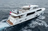 Luxurious 2020 Ocean Alexander 100 MY yacht cruising on open sea.