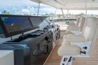 Luxurious Ocean Alexander 100 MY 2020 yacht helm with modern navigation displays and plush seating.
