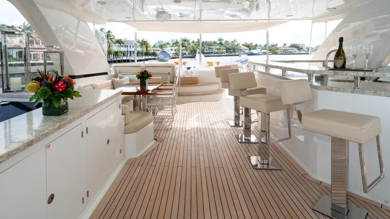 Iridescence Yacht Photos Pics Luxurious Ocean Alexander 100 MY yacht interior with elegant bar and seating, 2020 model.