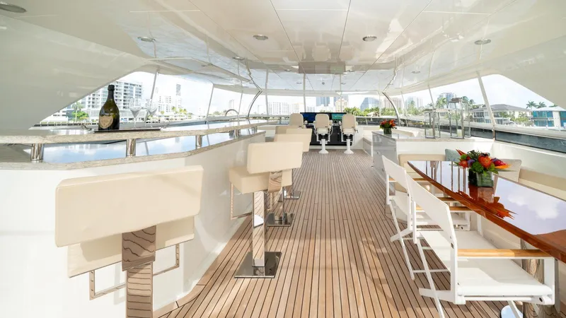 Iridescence Yacht Photos Pics Luxurious Ocean Alexander 100 MY 2020 yacht deck with elegant seating and dining area.