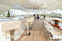 Luxurious Ocean Alexander 100 MY 2020 yacht deck with elegant seating and dining area.