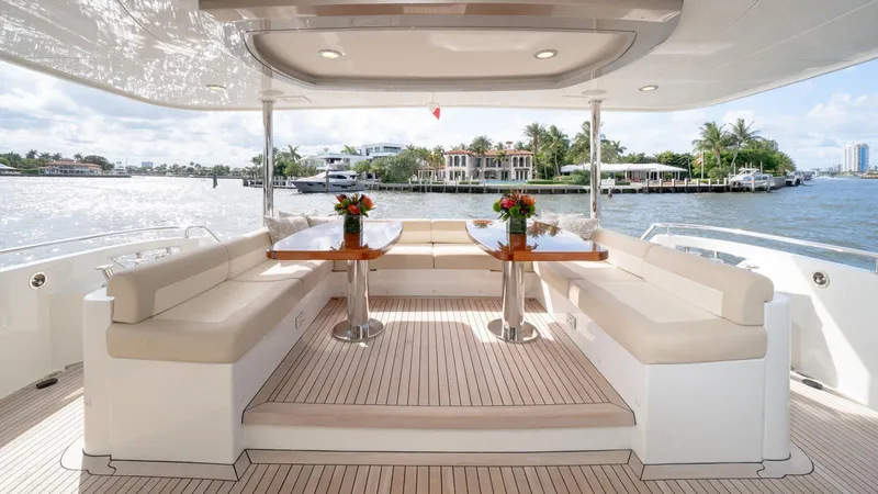 Iridescence Yacht Photos Pics Luxurious 2020 Ocean Alexander 100 MY yacht deck with elegant seating and waterfront view.
