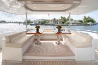 Luxurious 2020 Ocean Alexander 100 MY yacht deck with elegant seating and waterfront view.