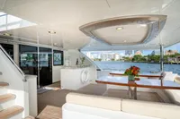 Luxurious Ocean Alexander 100 MY yacht deck with elegant seating and waterfront view, 2020 model.