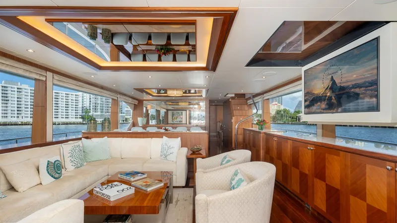 Iridescence Yacht Photos Pics Luxurious interior of 2020 Ocean Alexander 100 MY yacht with elegant seating and large windows.