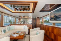 Luxurious interior of 2020 Ocean Alexander 100 MY yacht with elegant seating and large windows.