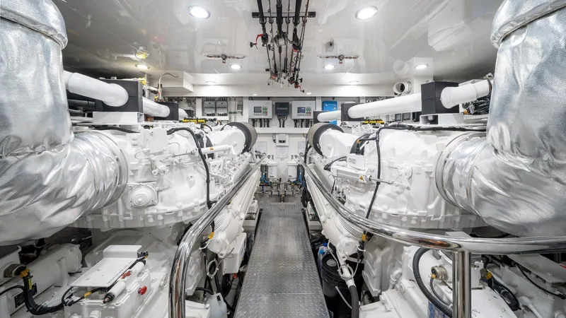 Iridescence Yacht Photos Pics Engine room of 2020 Ocean Alexander 100 MY yacht, featuring advanced machinery and equipment.