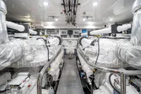 Engine room of 2020 Ocean Alexander 100 MY yacht, featuring advanced machinery and equipment.
