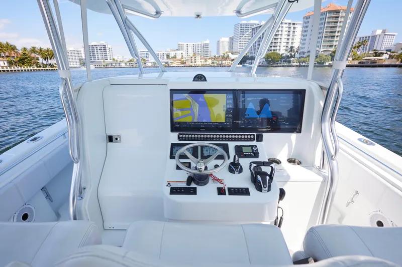  Yacht Photos Pics 2022 Contender 44 Fisharound helm with advanced navigation displays and controls.