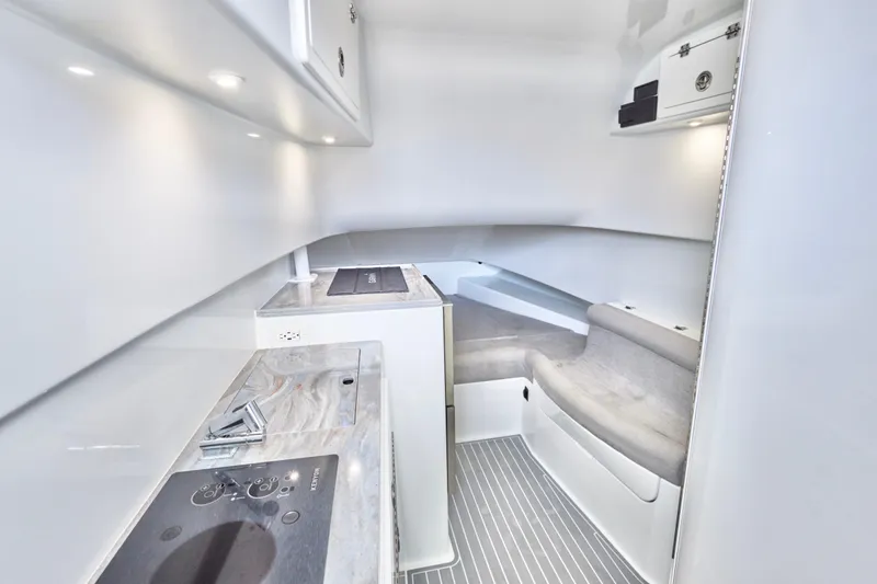  Yacht Photos Pics Luxurious interior of 2022 Contender 44 Fisharound boat with modern amenities.